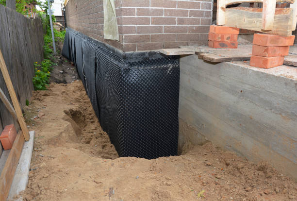 SJ Waterproofing Pros technician performing targeted Basement Waterproofing assessment in Juliustown, NJ